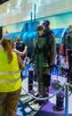 Visitors attentively examine the military diverÃ¢â¬â¢s suit at the army exhibition `Our IDF`